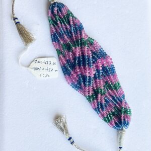 Multi-gem bracelet with ruby, emerald, and sapphire bead strands