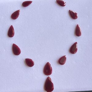Natural ruby pear cut loose gemstones arranged in circular layout