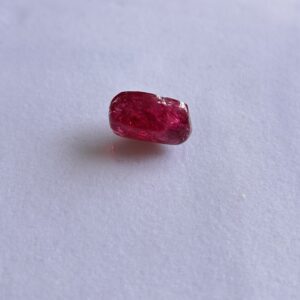 Natural spinel tumble cabochon gemstone in deep red color