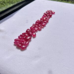Natural ruby tumble loose gemstones in bright pinkish red tones